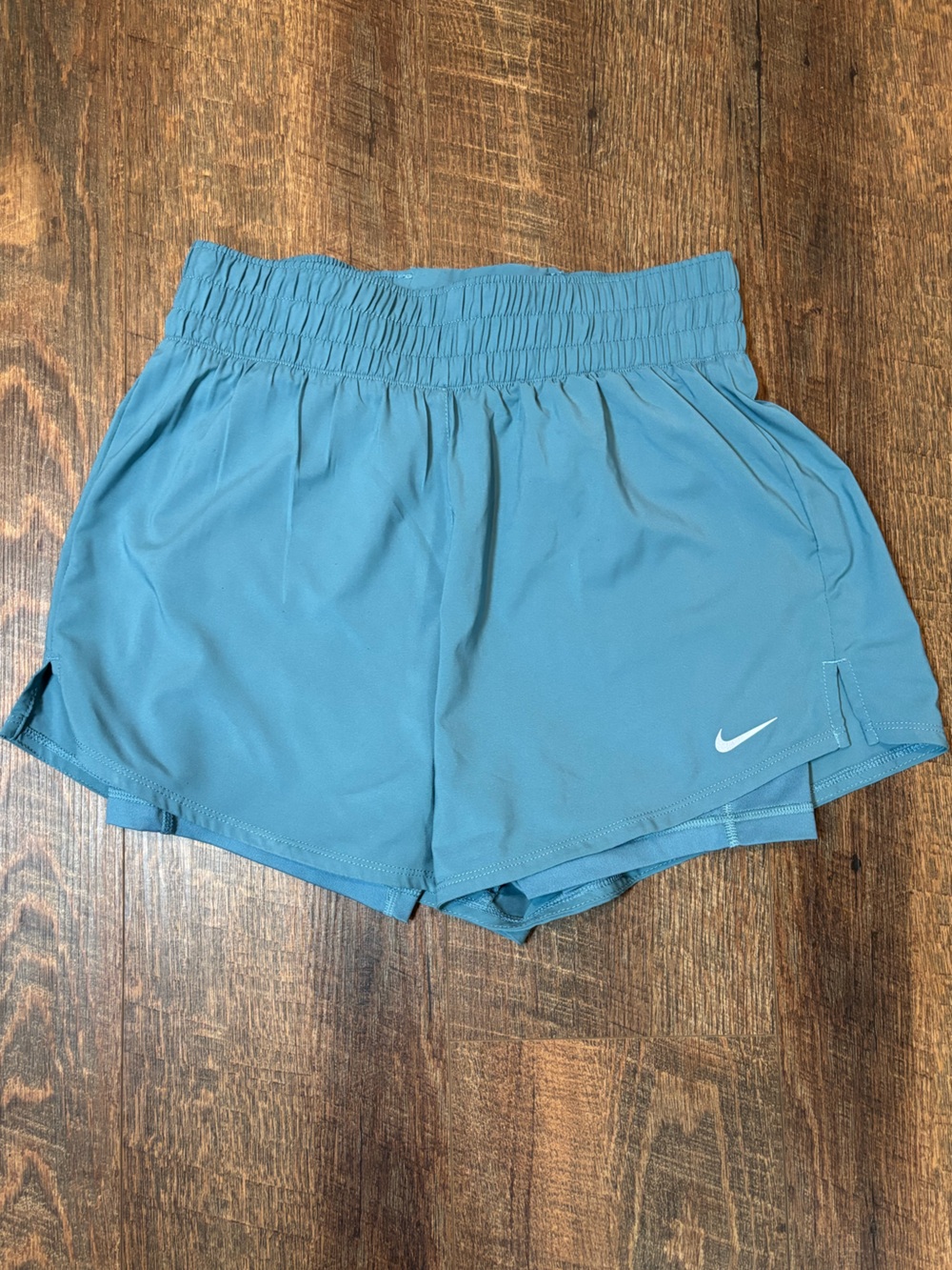 Nike Teal Blue running shorts with built in spandex